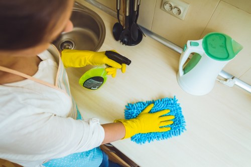 Technician performing sofa cleaning in Ickenham with specialist equipment