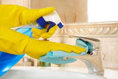 Professional carpet cleaning team following safe working practices